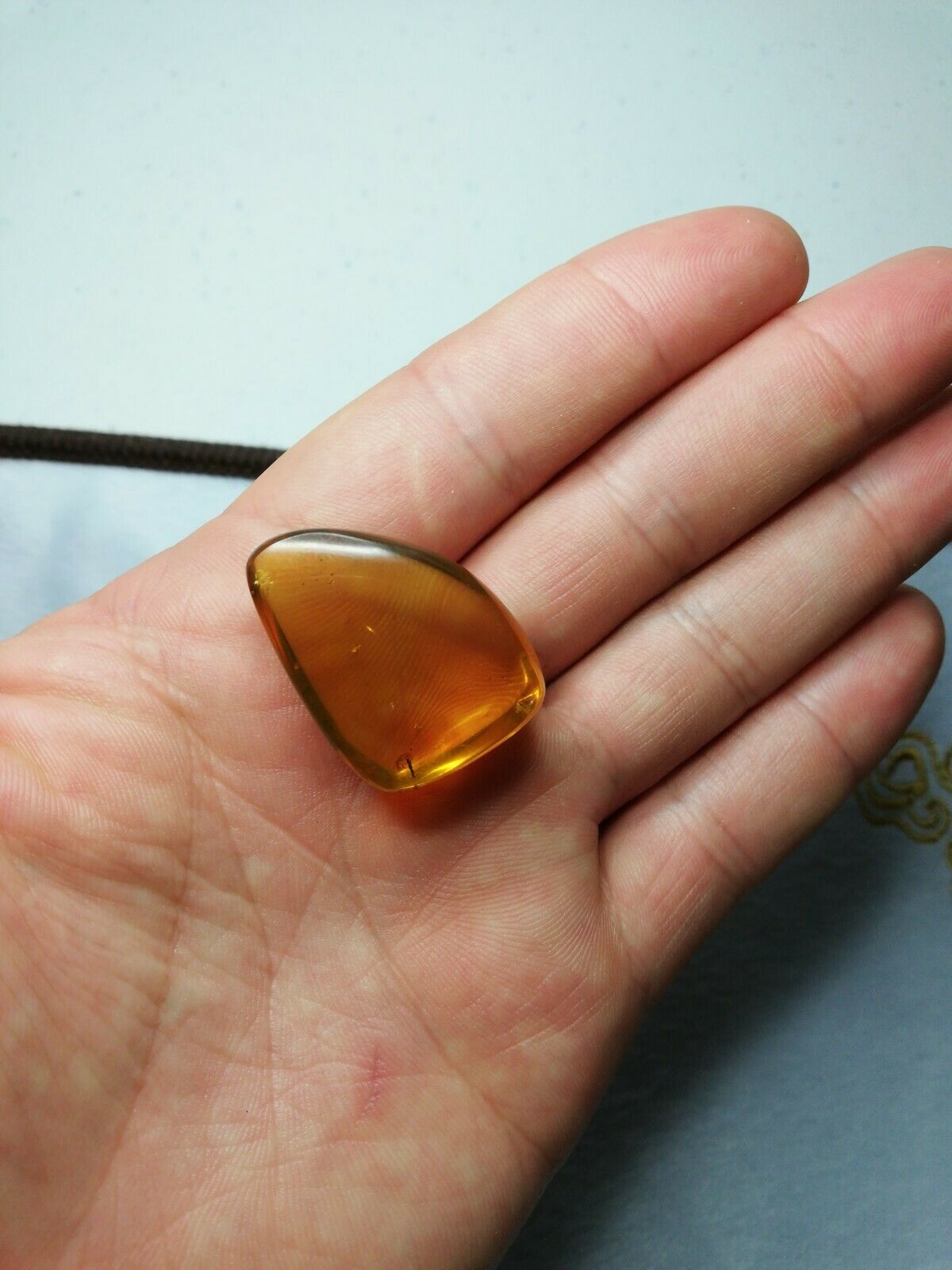 Clear Mexican Amber 5.3g fully polished blue green