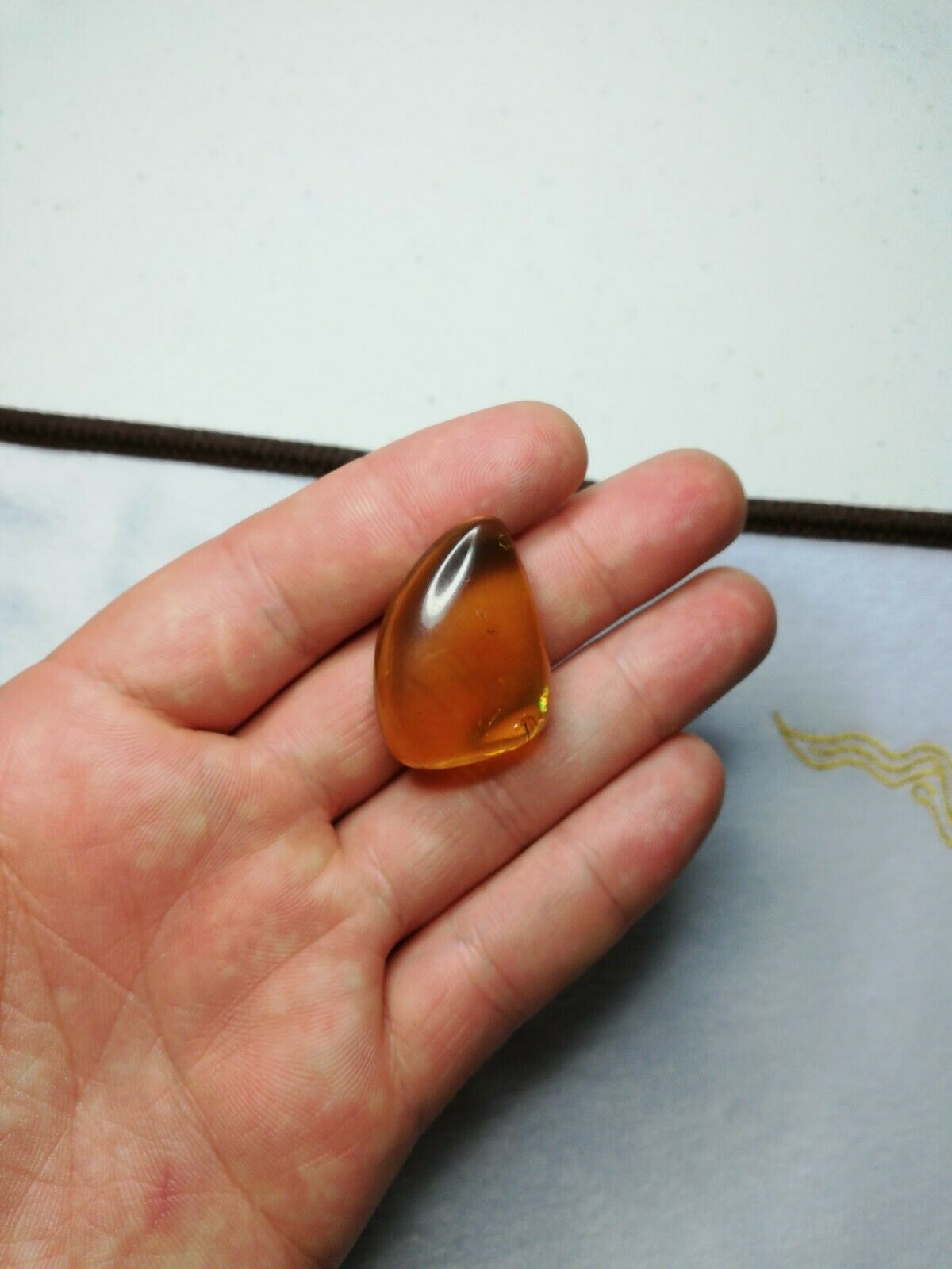 Clear Mexican Amber 5.3g fully polished blue green