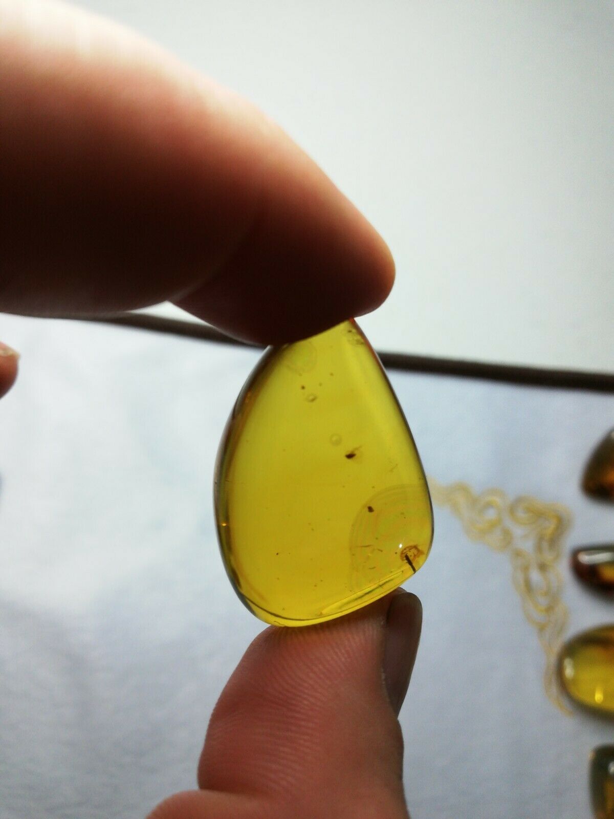Clear Mexican Amber 5.3g fully polished blue green