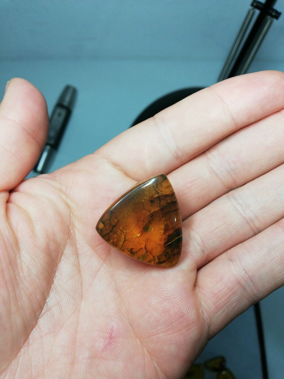 Mexican Amber 5.5g cabochon with natural crust special blue green color
