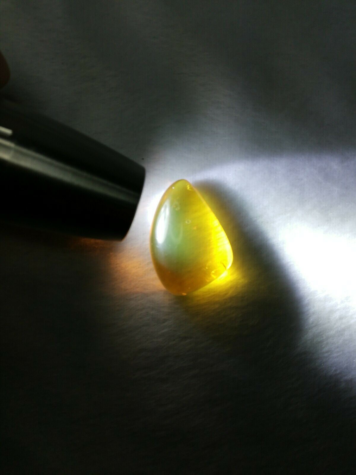 Clear Mexican Amber 5.3g fully polished blue green