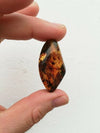 Some purple w blue green Mexican Amber 8.6g full polished pendant