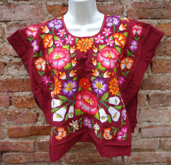 huipil dress Hand made Black made in Oaxaca, Mexico A belt or shawl can be used to cinch at the waist Sew your own: Mexican-style huipil
